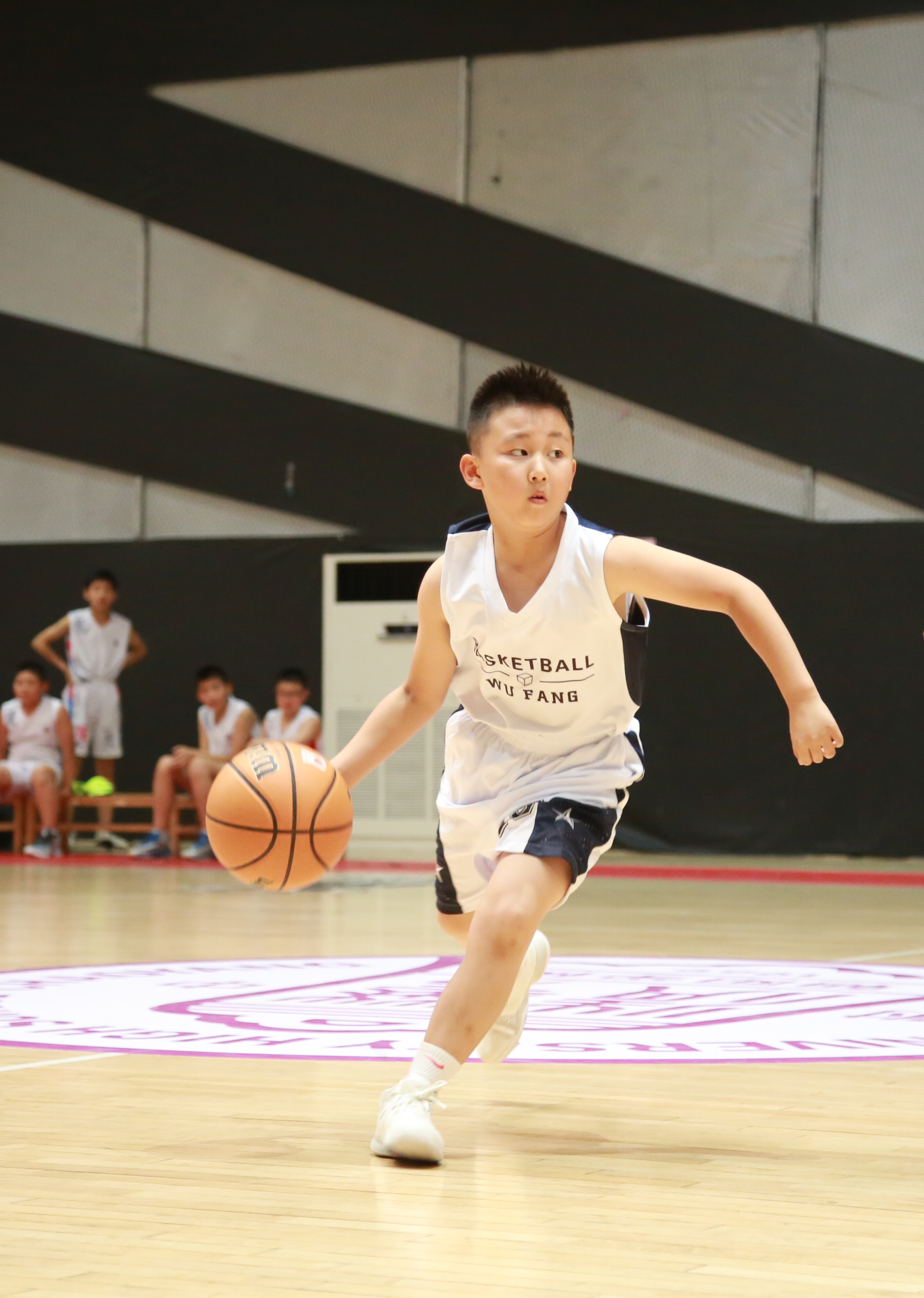 Young Nick playing basketball